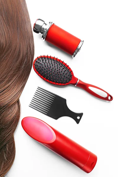 Barber set with strand of hair, tools and cosmetics — Stock Photo, Image