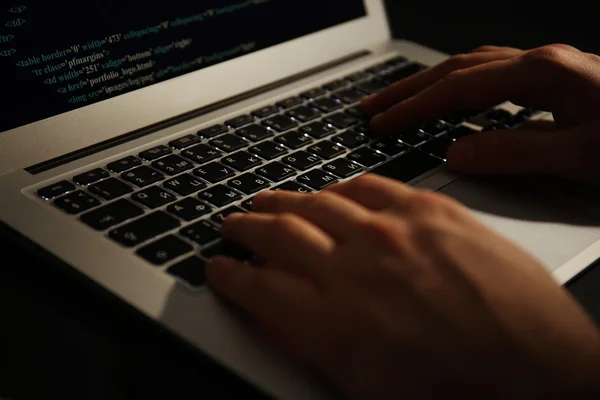 Hacker using laptop — Stock Photo, Image