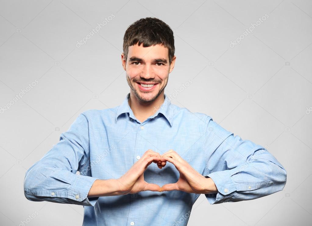 Man Making Heart With Hands Stock Photo Image By C Belchonock 102143842