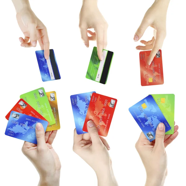 Руки с кредитными картами — стоковое фото