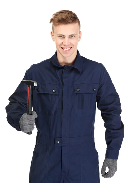 一个年轻的修理工拿着锤子 在白色的背景上 — 图库照片