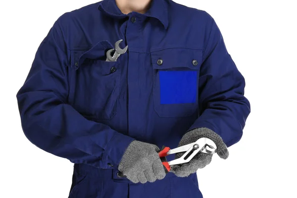 Un reparador sosteniendo alicates — Foto de Stock
