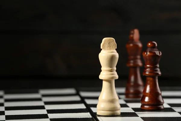 Chess pieces and game board — Stock Photo, Image