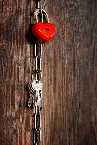 Love heart hanging on chain — Stock Photo, Image