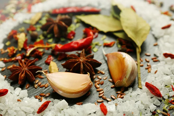Different spices on wooden table, closeup — Stock Photo, Image