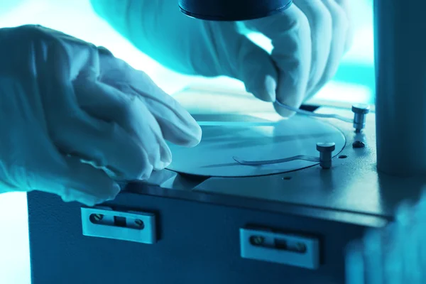 Scientist working with microscope — Stock Photo, Image