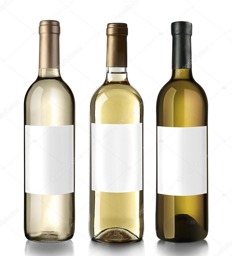 Bottles of white wine with empty labels — Stock Photo © belchonock 103080668
