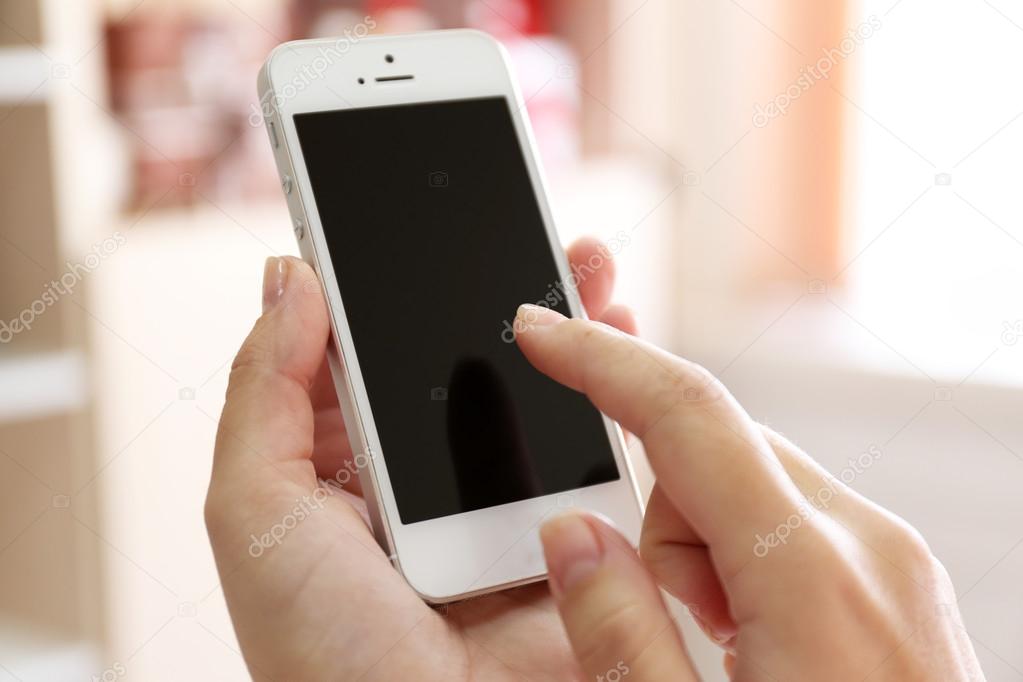 Woman holding smartphone 