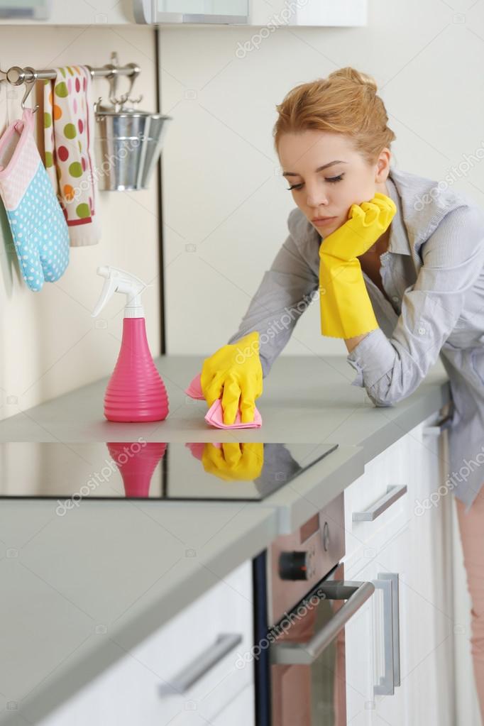 Young woman scrubbing Stock Photo by ©belchonock 103093286