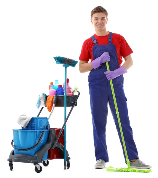 Young janitor with cleaner cart — Stock Photo, Image