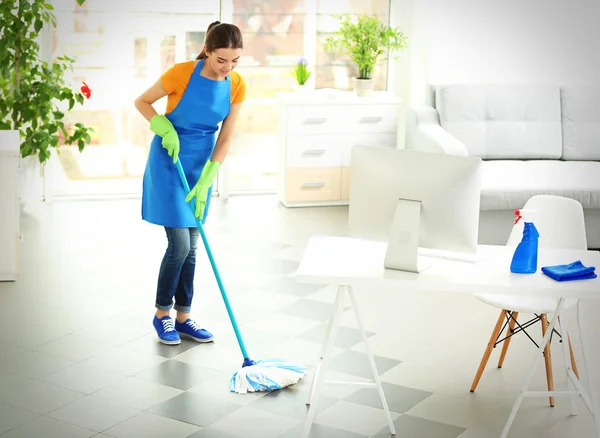 Woman cleaning floor