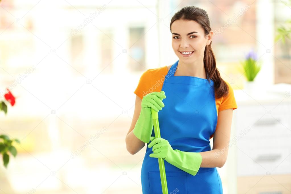 Woman cleaning with mop
