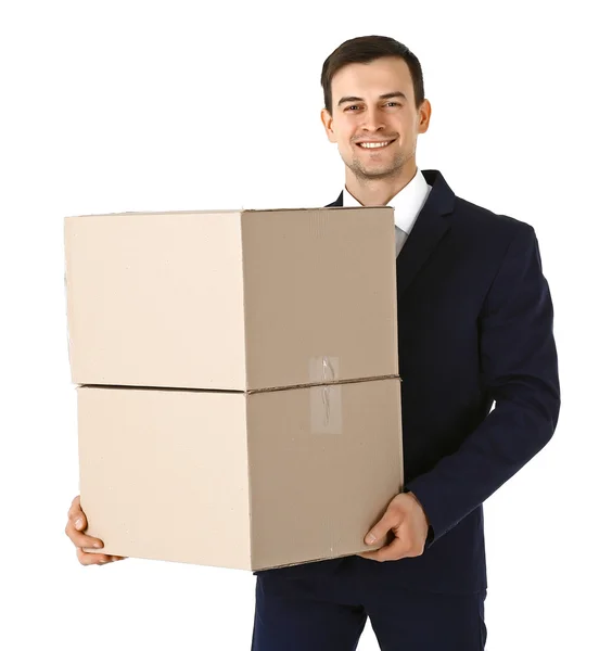 Hombre de traje sosteniendo cajas de cartón — Foto de Stock