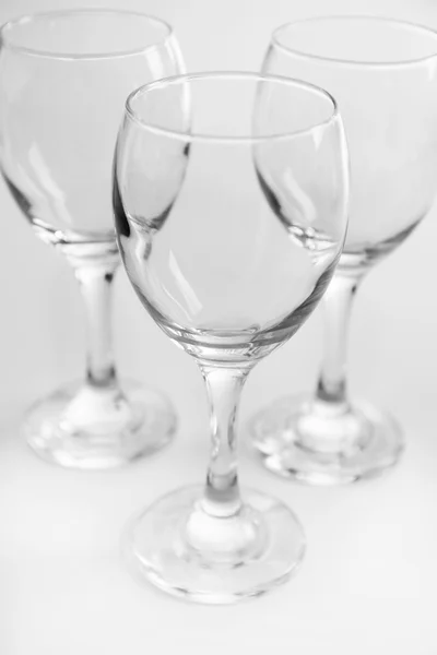 Wineglasses on white table — Stock Photo, Image