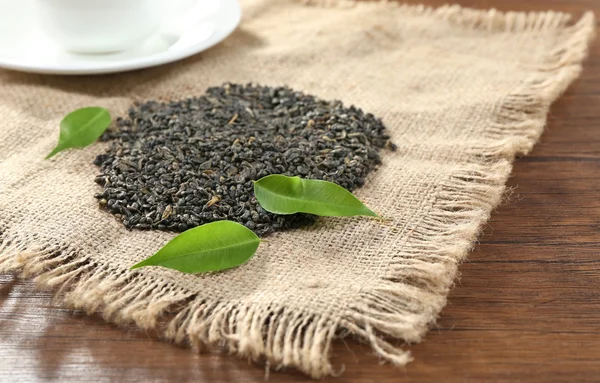 Dry tea with green leaves — Stock Photo, Image