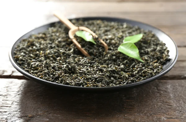 Dry tea with green leaves — Stock Photo, Image