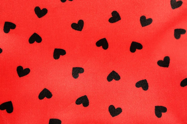 Patrón corazones negros en rojo —  Fotos de Stock