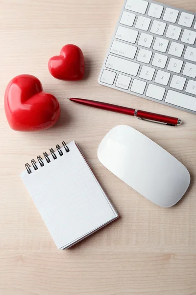 Computer peripherals with red hearts, pen and notebook — Stock Photo, Image