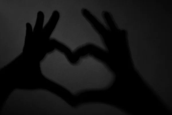 Hand shaped heart on  background — Stock Photo, Image