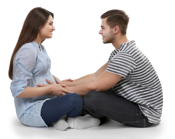 Jonge zwangere vrouw zit met man — Stockfoto