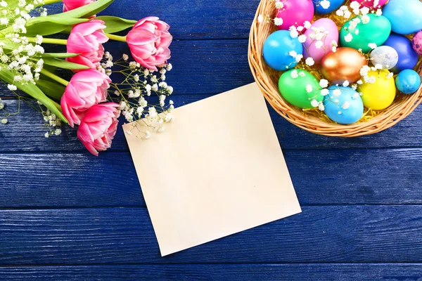 Colorful Easter eggs with greeting card — Stock Photo, Image