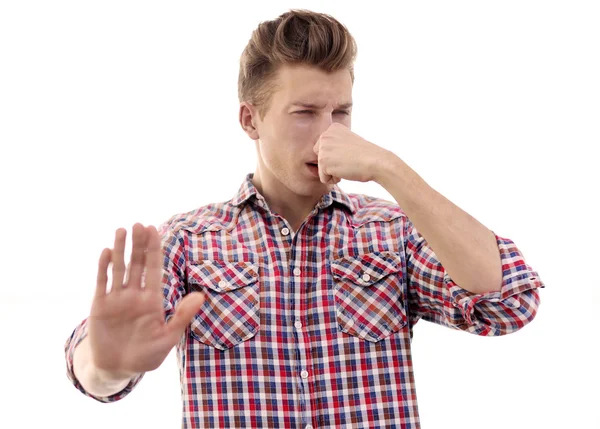 Young Blonde Man Pinching His Nose Because Stench Isolated White — Stock Photo, Image