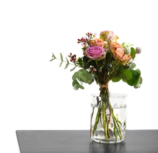 Jar of roses on table — Stock Photo, Image