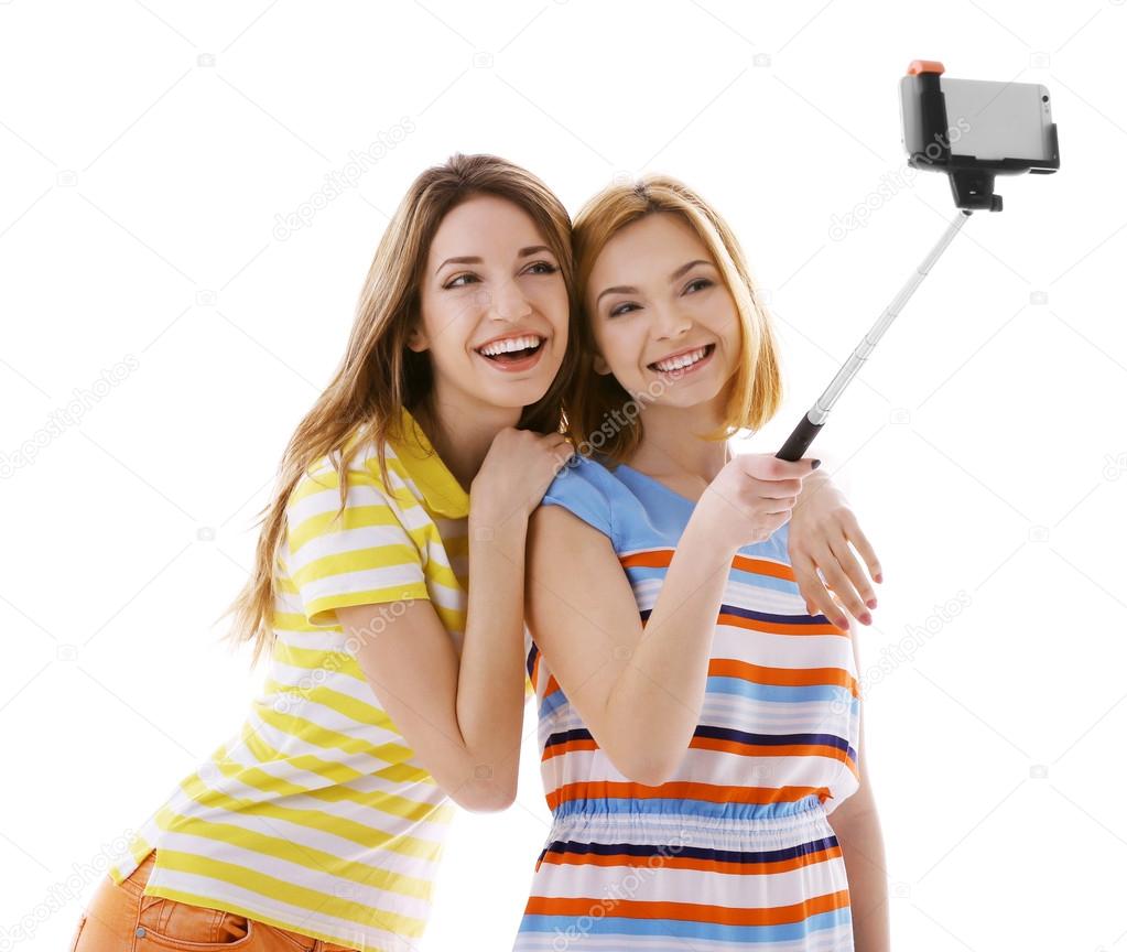 Two young women taking selfie 