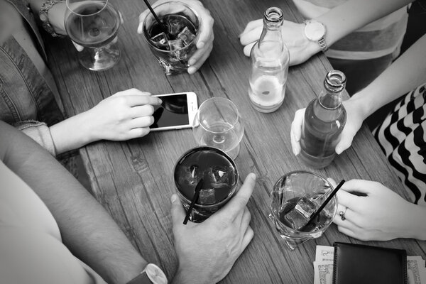 Friends having alcoholic drinks in the bar