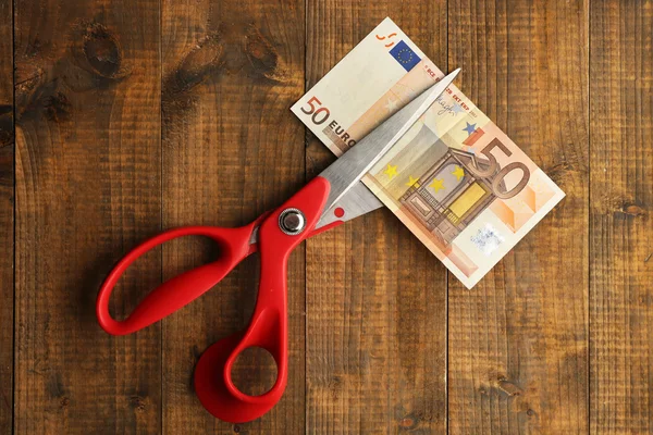 Scissors cuts euro banknote — Stock Photo, Image