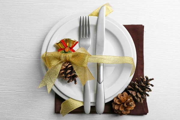 Christmas serving cutlery on plate — Stock Photo, Image