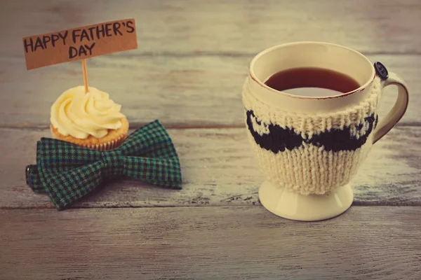 Cup of tea with knitted mustache — Stock Photo, Image