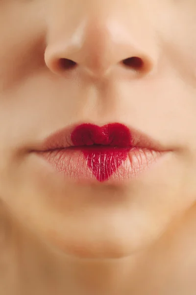 Sexy lips with heart shape paint — Stock Photo, Image