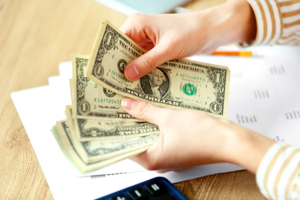 Woman counting money