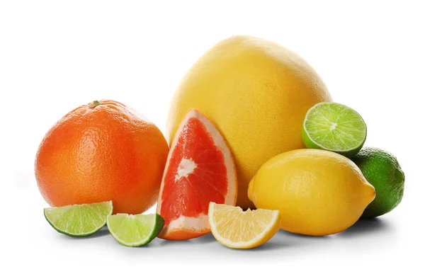 Mixed citrus fruit including lemon, grapefruits, limes and pomelo isolated on a white background, close up — Stock Photo, Image