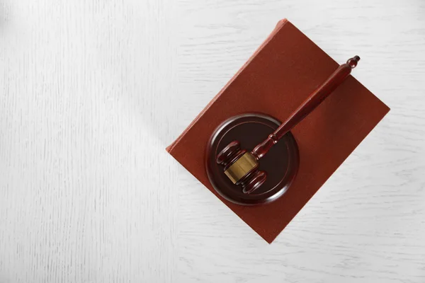 Wooden gavel with book — Stock Photo, Image