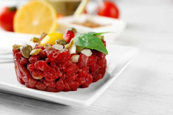 Beef tartare served on a plate — Stock Photo, Image