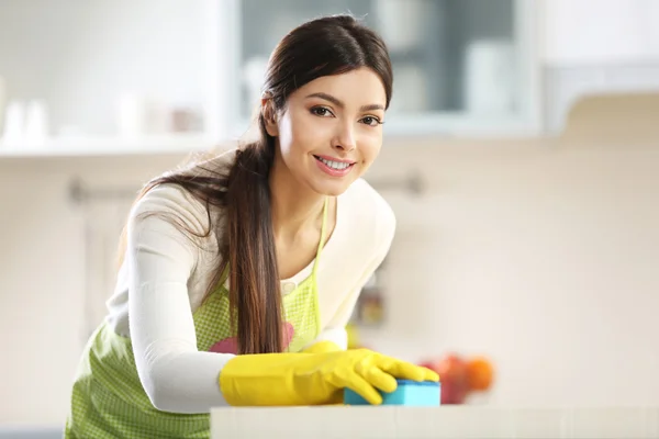 Beautiful woman in protective gloves — Stock Photo, Image