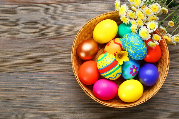 Easter eggs in basket — Stock Photo, Image