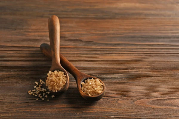 Wooden spoons with sea salt — Stock Photo, Image