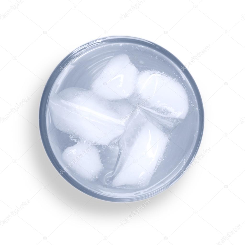 Glass of water with ice blocks isolated on white background, top view