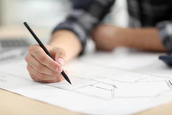 Engineer working with blueprints — Stock Photo, Image