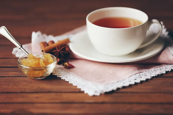 Cup of tea, honey and spices on table closeup — Stock Photo, Image