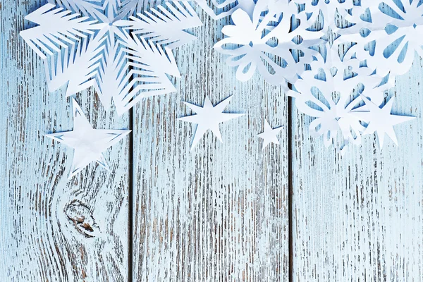 Snowflakes on wooden background — Stock Photo, Image