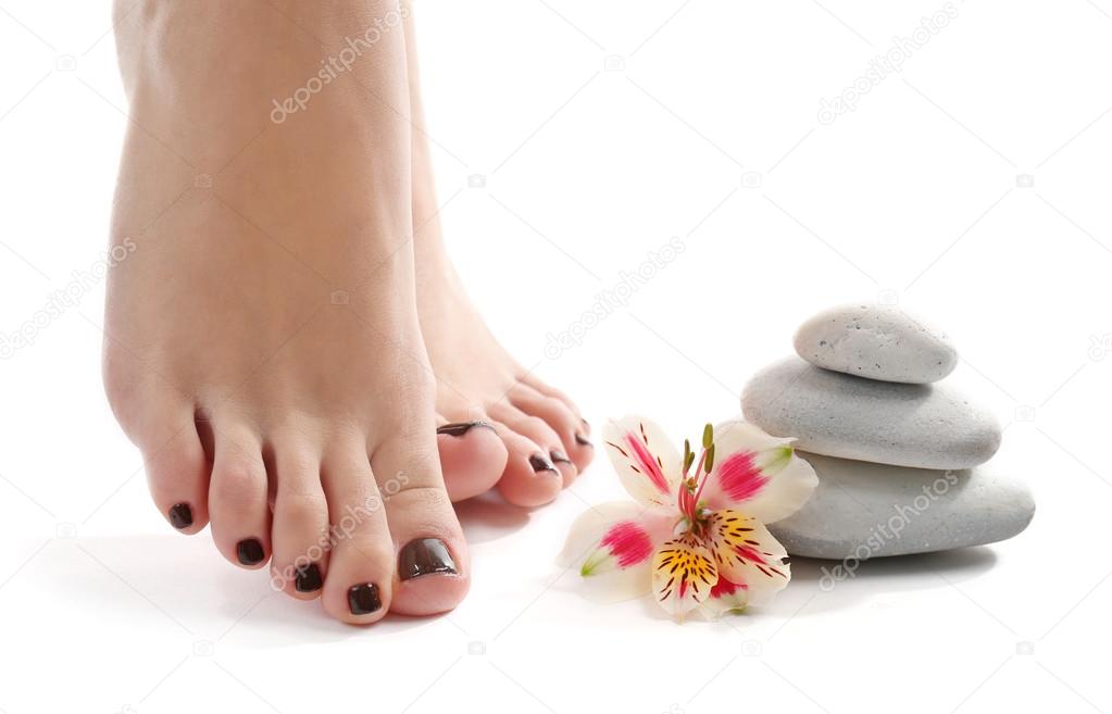 Manicured female feet