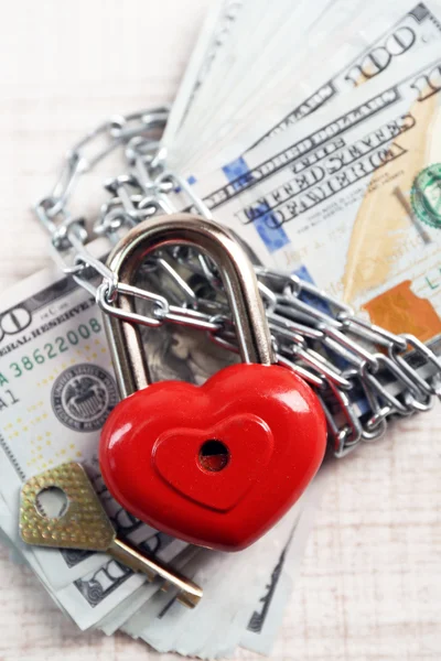 Dollars currency with lock and chain — Stock Photo, Image