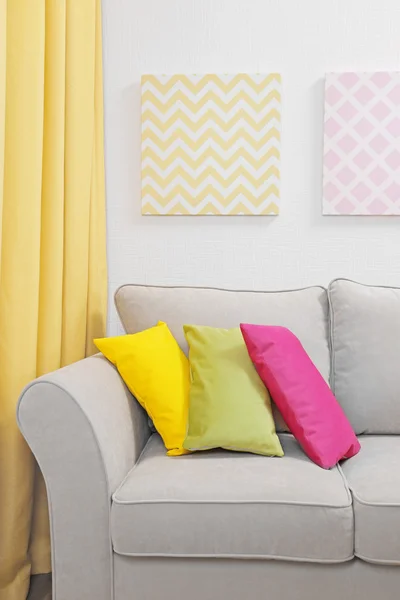 Couch with pillows in room — Stock Photo, Image