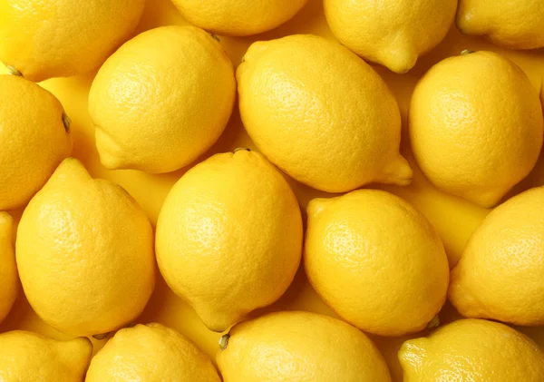 Fresh lemons background — Stock Photo, Image