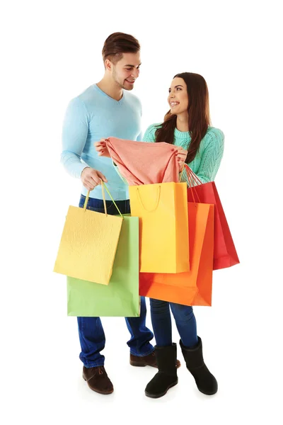 Pareja con coloridas bolsas de compras —  Fotos de Stock