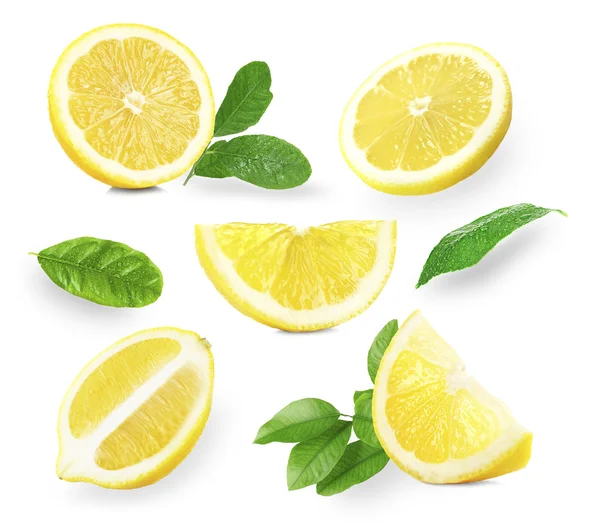 Набор свежих лимонов с листьями — стоковое фото